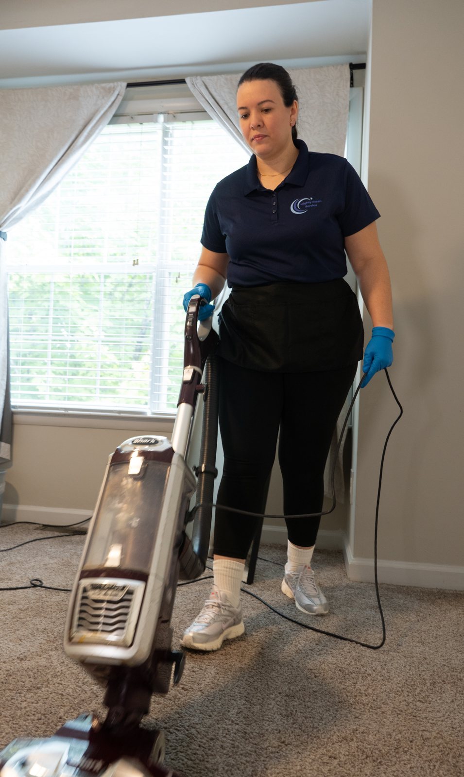Vacuuming by Mighty Clean Service